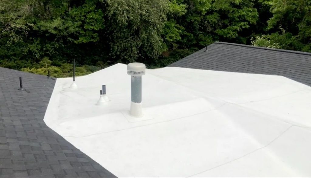 TPO flashing detail sealed around a roof pipe penetration
